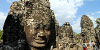 Angkor Wat stone carvings of faces, Siem Reap, Cambodia.  - 