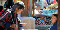 Counting Money in Paro - 