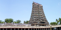 Meenakshi Temple in Madurai - 1, Tamil Nadu - Pyramidal gates known as gopuras rise more than 160 feet (49 meters) into the air at the four cardinal points of the Sree Meenakshi Temple Complex. These towering gateways are entrances to the temple complex while shorter gopuras lead to the sanctums of the main dieties.